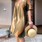 Helena - Elegante vestido camisero con escote en pico