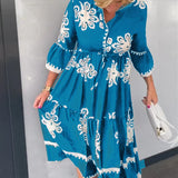 Katia - Vestido de diseñador con estampado floral y mangas 3/4