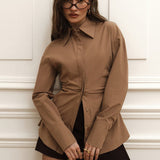 Blusa vintage de algodón con cintura fruncida y corte ajustado