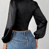 Blusa vintage de manga larga en encaje y malla corsé.