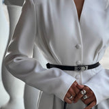 Blazer con escote en pico y detalle en la cintura