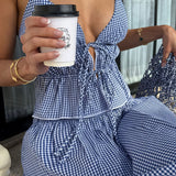 Conjunto de top corto con cuello halter y falda de vendaje con cordones