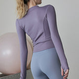 Chaqueta de manga larga elegante y ajustada para yoga, pilates y running.