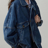 Chaqueta utilitaria en denim lavado con cuello alto