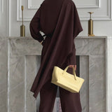 Elegante conjunto vintage de dos piezas: top vuelto y pantalón ancho