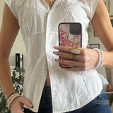 Blusa versátil a cuadros rojos y blancos