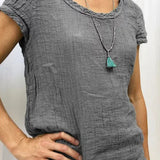Camiseta de mujer – Corte holgado – Textura arrugada – Tejido transpirable – Mangas cortas