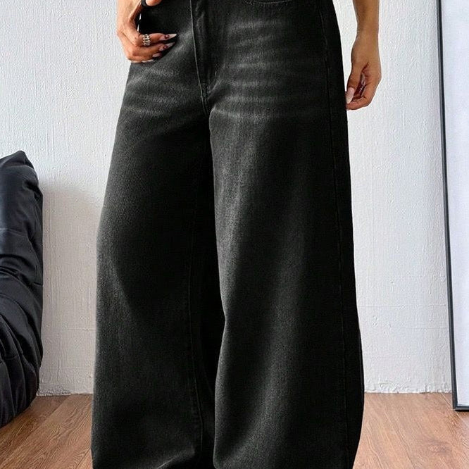 Vaqueros vintage de mezclilla descolorida con piernas anchas