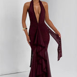 Vestido de noche sexy de sirena con escote pronunciado y espalda abierta.