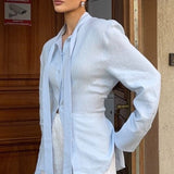 Blusa vintage de algodón con lazo delantero