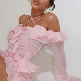 Elegante conjunto de falda con volantes, mangas largas y hombros descubiertos