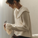 Blusa vintage con mangas acampanadas y volantes