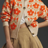 Elegante cárdigan de manga larga en punto jacquard floral