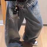Vaqueros de pierna ancha bordados con letras florales Y2K