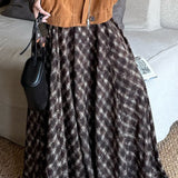 Falda midi fluida de cintura alta con estampado de cuadros vintage en tonos naturales
