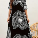 Vestido de mujer de corte A - Cuello redondo - Mangas al codo - Elegante estampado abstracto