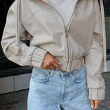 Chaqueta de calle oversize con capucha en piel sintética negra