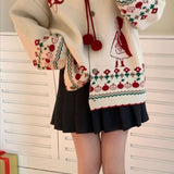 Chaleco oversize con pompones