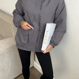 Chaqueta impermeable con capucha y cordón, corte holgado, informal, para senderismo al aire libre.