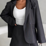 Elegante conjunto de blazer y pantalones cortos