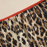 Falda corta elástica con estampado de leopardo y lentejuelas.