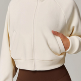 Chaqueta de yoga cálida y resistente al viento con cuello alto y cierre de cremallera, forrada de polar, con forro y cuello alto.
