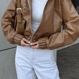 Chaqueta de calle oversize con capucha en piel sintética negra