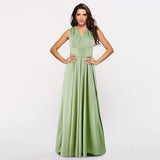 Elegante vestido largo multiposición con tirantes ajustables.