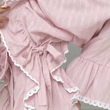 Elegante blusa jacquard con mangas acampanadas y mangas anchas.