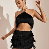 Glamuroso conjunto de dos piezas con flecos: elegante, atrevido y cómodo para mujeres.