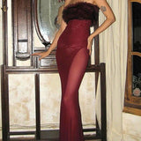 Vestido largo, sin tirantes y ajustado de malla transparente con inserciones de piel.