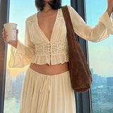 Conjunto de falda y top de encaje sexy y gasa transparente con cierre de lazo.