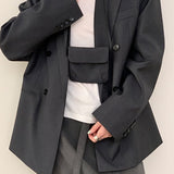 Blazer con cinturón estilo viajero