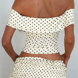 Conjunto de falda larga con bustier de lunares y lazo lateral