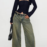 Blusa de rayas con cuello abotonado y mangas largas caladas
