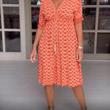 Camille - Vestido estampado con escote en V y flecos