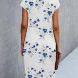 Anika - Vestido blanco con estampado floral azul
