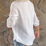 Pauline - Blusa lisa con cuello en V
