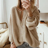 Cárdigan de mujer – Corte oversize – Punto suave – Abotonado – Puños acanalados