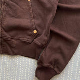 Sudadera vintage con remaches y cremallera.