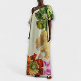 Skylar - Maxi vestido con estampado floral, escote asimétrico y mangas abullonadas
