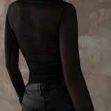 Blusa estampada moderna y sexy con cuello redondo.