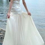 Vestido largo fluido sin tirantes con paneles de lentejuelas