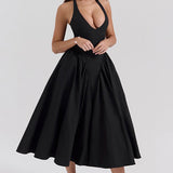 Vestido de noche sin espalda con tirantes y pajarita