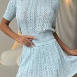 Conjunto de falda y cuello redondo de punto ligero calado en color liso