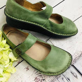 Zapatos Mary Jane para mujer: punta redonda clásica, correa con hebilla y suela cómoda.