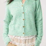 Cárdigan de punto verde chic y elegante con puños.