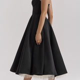 Vestido de noche largo con escote en pico y detalles abullonados