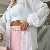 Blusa casual chic lisa de manga larga
