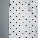 Conjunto sexy de camiseta sin mangas de lunares y falda ajustada